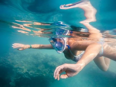 woman snorkel in underwater exotic tropics paradise tropical sea. Marsa alam, Egypt. Summer holiday vacation concept