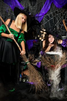 witches with brooms and conjure brewed potion