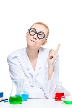 Portrait of a beautiful lab assistant with glasses with a good idea