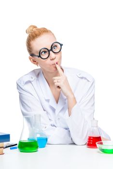 On white background portrait of a pensive crazy laboratory assistant