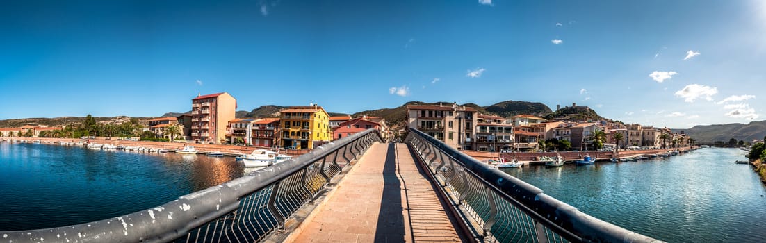 Panoramic view of ancient village of Bosa on Temo river in a sunny morning of summer - Sardinia - Italy