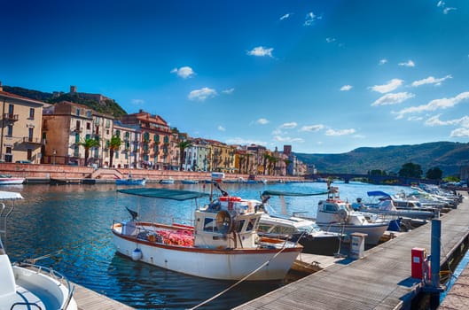 View of ancient village of Bosa on Temo river in a sunny morning of summer - Sardinia - Italy