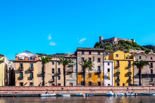 View of ancient village of Bosa on Temo river in a sunny morning of summer - Sardinia - Italy