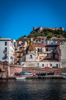 View of ancient village of Bosa on Temo river in a sunny morning of summer - Sardinia - Italy