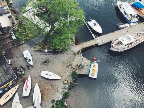 Beautiful boats. Aerial view of colorful boats in Stockholm, Sweden. Summer seascape with ships, sunny day. Top view, yachts from flying drone