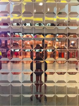 Glass background in shopping mall, colored square texture wall