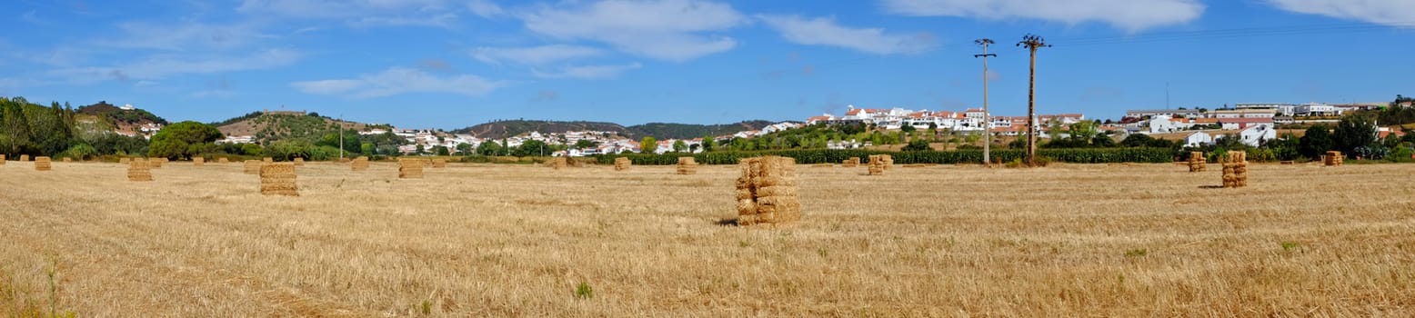 Panorama from haybales in the fields in Alentejo Portugal