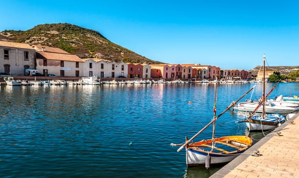 View of ancient village of Bosa on Temo river in a sunny morning of summer - Sardinia - Italy