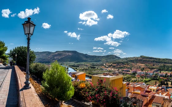 View of ancient village of Bosa on Temo river in a sunny morning of summer - Sardinia - Italy