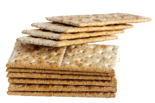 some whole wheat crackers on white background