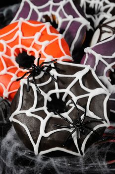 Glazed donuts decorated with cobwebs for Halloween
