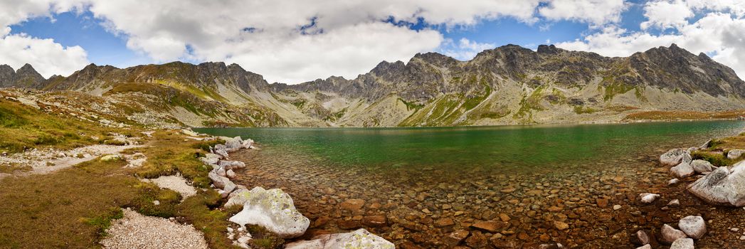 Alpine lake Velke Hincovo Pleso, with a great view on High Tatra mountains.