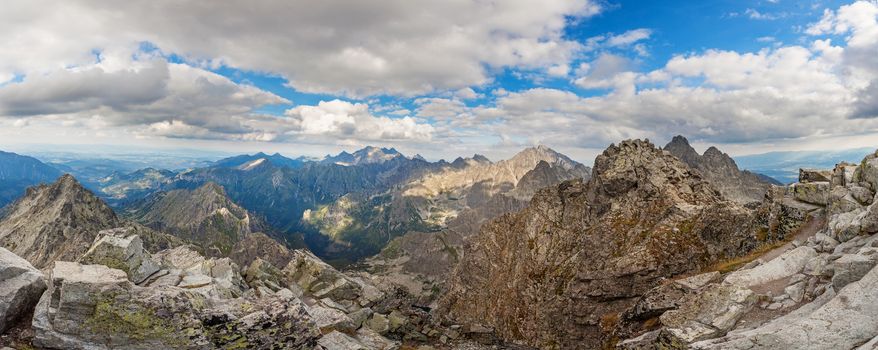 View on high Tatra Mountains from Rysy mountain with dramatic cloudy sky