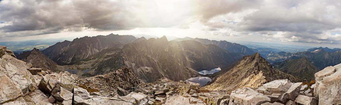 View on high Tatra Mountains from Rysy mountain with dramatic cloudy sky