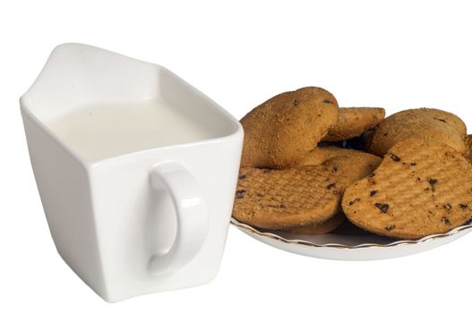 milk and biscuits with chocolate drops on a white background