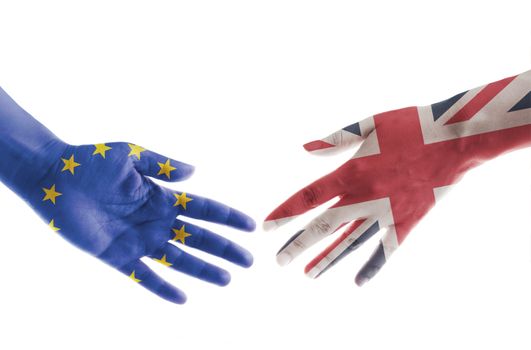 Hands painted with UK and European flags reaching out for a handshake 