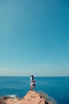 Young couple enjoy beautiful sea view on vacation