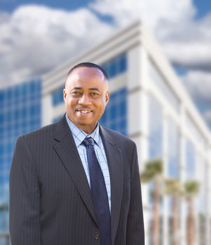 Handsome African American Businessman In Front of Corporate Building.