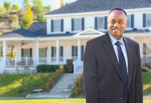 African American AgentIn Front of Beautiful Custom House.