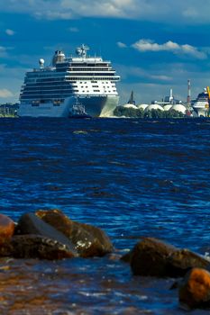 Big white cruise ship sailing to the Baltic sea at clear day