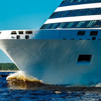 Big white cruise ship sailing to the Baltic sea at clear day