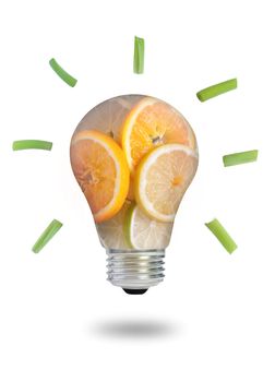 Light bulb made of fruits and vegetables over a white background