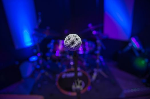 Microphone on stage against a background of auditorium, France