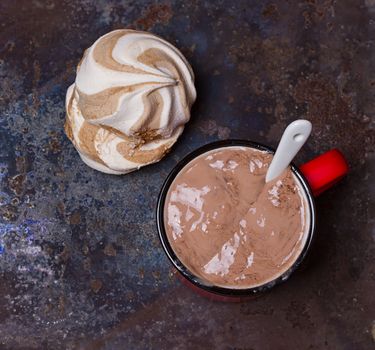 hot chocolate with marshmallows in a ceramic cup on grounge