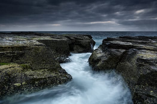Ocean zig zags its way through the rock channel
Location Nth Narrabeen, Australia