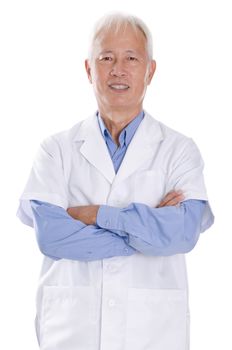 Portrait of old Asian man in lab coat arms crossed and smiling, standing isolated on white background.