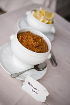 Bowl of red Italian spicy barbecue sauce.