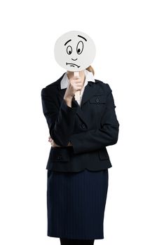 Businesswoman hiding her face behind round banner with sad smiley