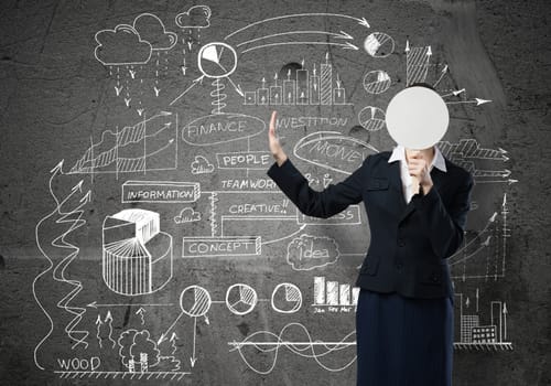 Businesswoman and graphs at background hiding her face behind mask