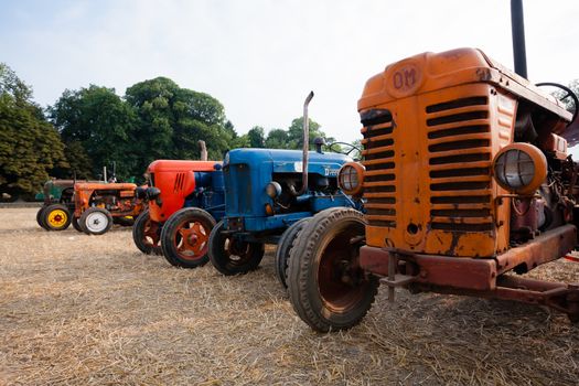 Old tractors in perspective, agricultural vehicle, rural life