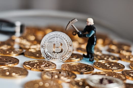 Cryptocurrency physical metal bitcoin coin. Digital currency virtual money concept.
