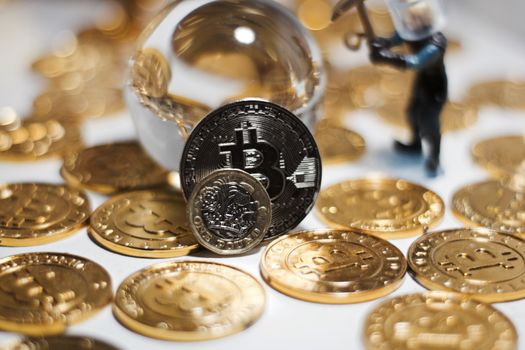 Cryptocurrency physical metal bitcoin coin. Digital currency virtual money concept.