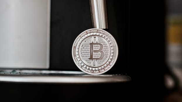 Cryptocurrency physical metal bitcoin coin. Digital currency virtual money concept.