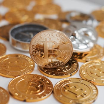 Cryptocurrency physical metal bitcoin coin. Digital currency virtual money concept.