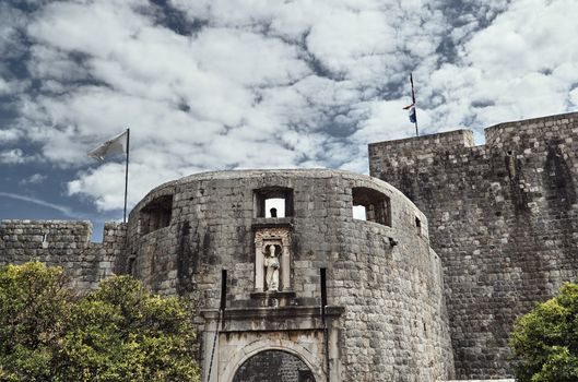 medieval gate and ramparts in the city of Dubrovnik in Croatia
