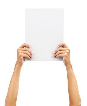Hands holding A4 size white blank paper card board, isolated on plain background.