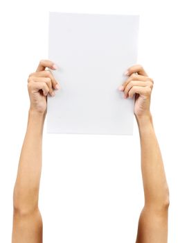 Hands holding A4 size white blank paper card, isolated on plain background.
