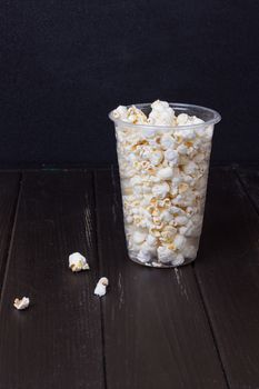 Popcorn in box on the black background
