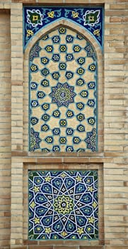 Old Eastern mosaic on the wall of a mosque, Uzbekistan