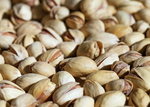 Close up of fresh pistashio nuts, background