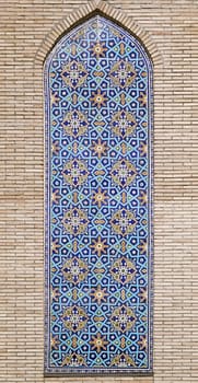 Old Eastern mosaic on the wall of a mosque, Uzbekistan