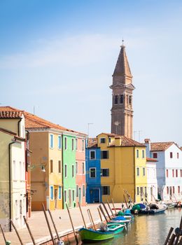 Burano Isle, close to Venice. Traditional colored houses during a sunny day.