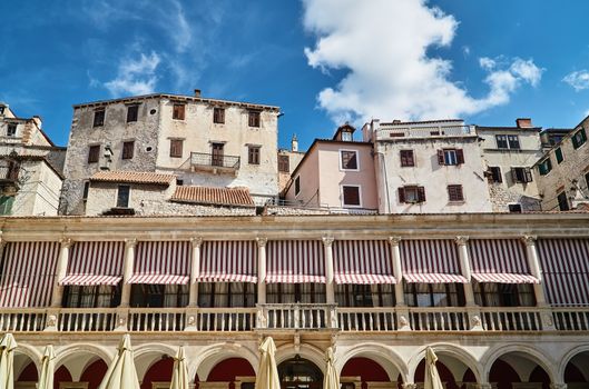 Renaissance town hall and stone houses in the city of Sibenik in Croatia