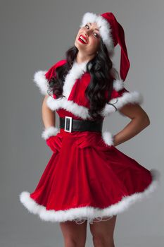 Portrait of beautiful sexy girl wearing santa claus clothes