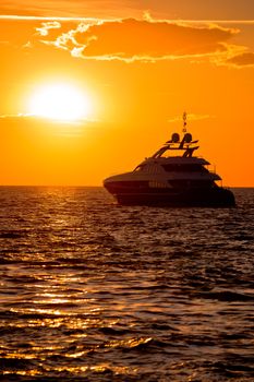 Luxury yacht on open sea at golden sunset, Zadar, Dalmatia, Croatia