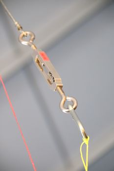 Cables and hook hanging from the Ceiling at the Construction site